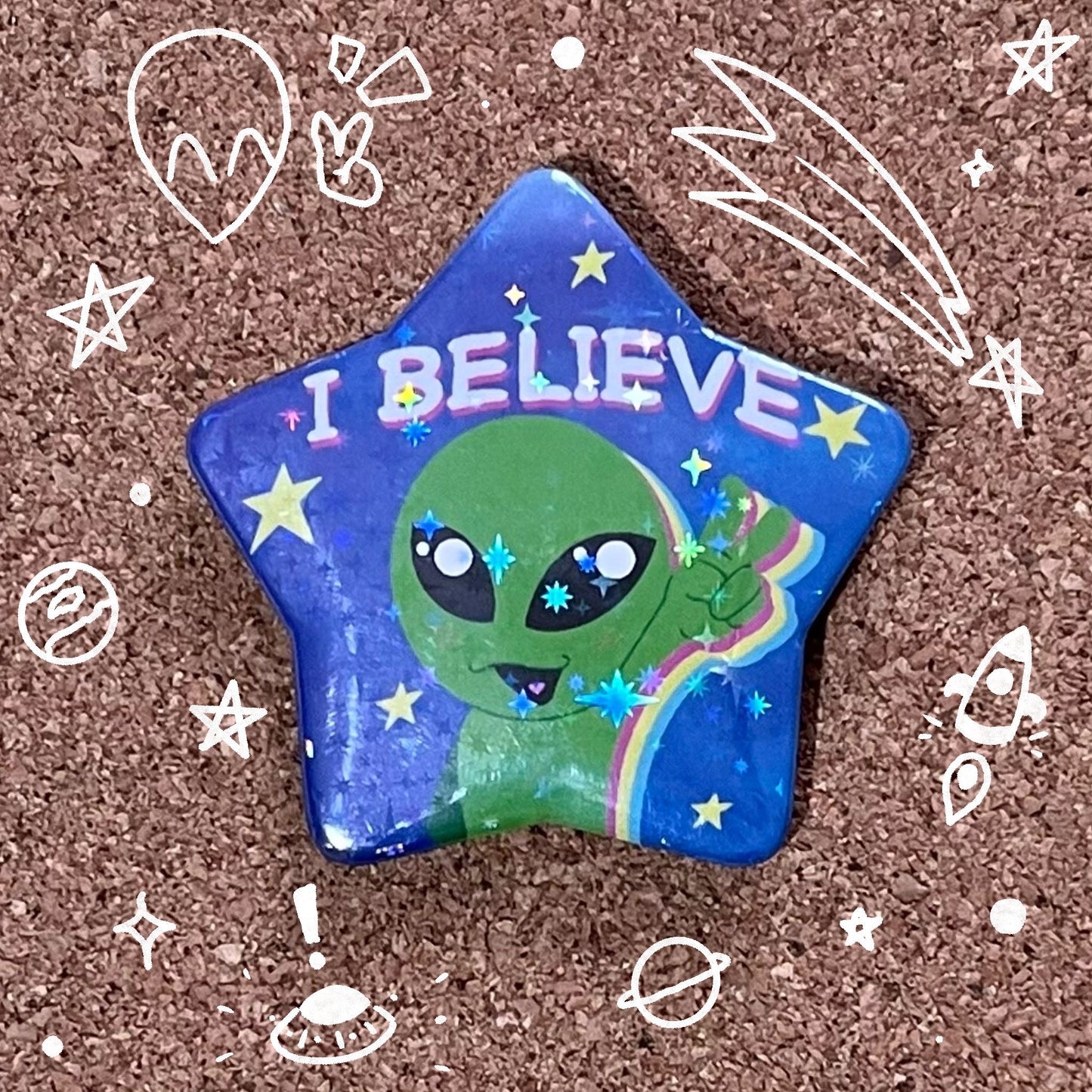 I believe Alien | Cryptid | Star badge